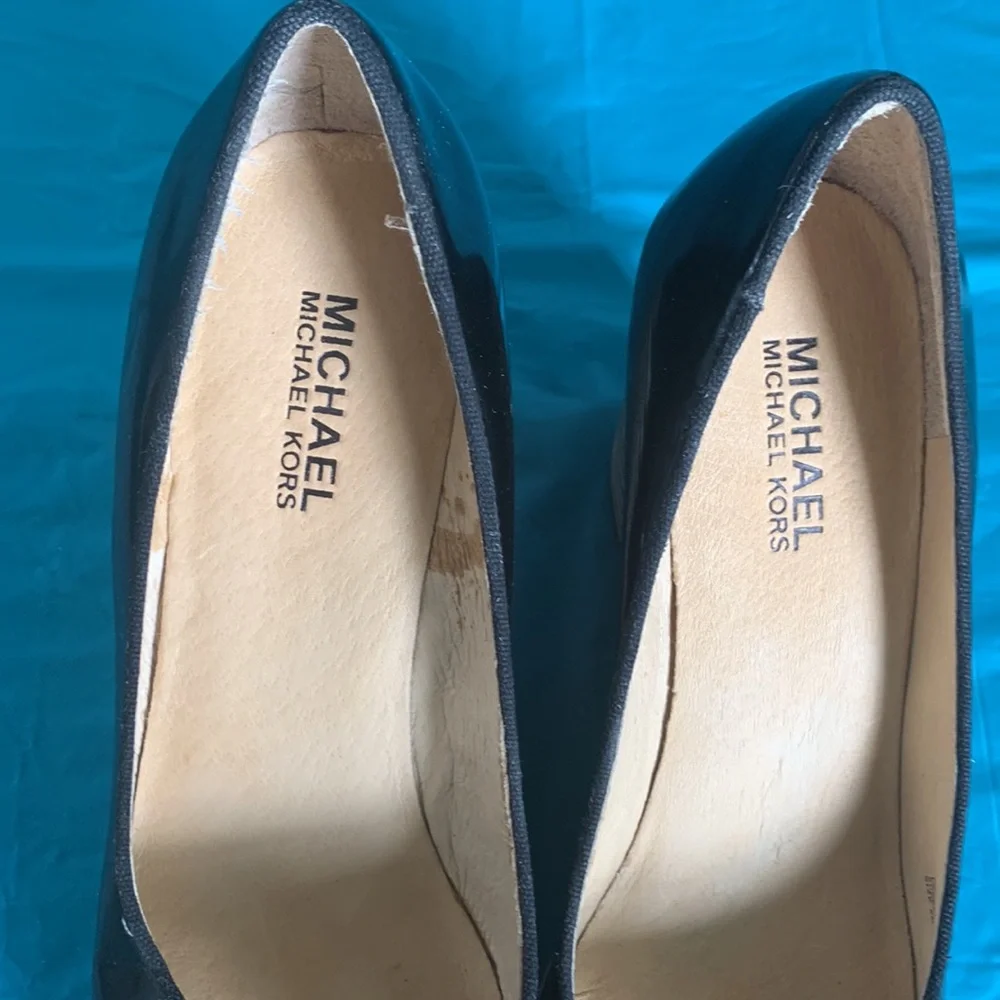 Gently worn Michael Kors Adlai’s Black and Cream Strip Wedge Shoes.